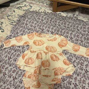 Kate Quinn skirted bodysuit